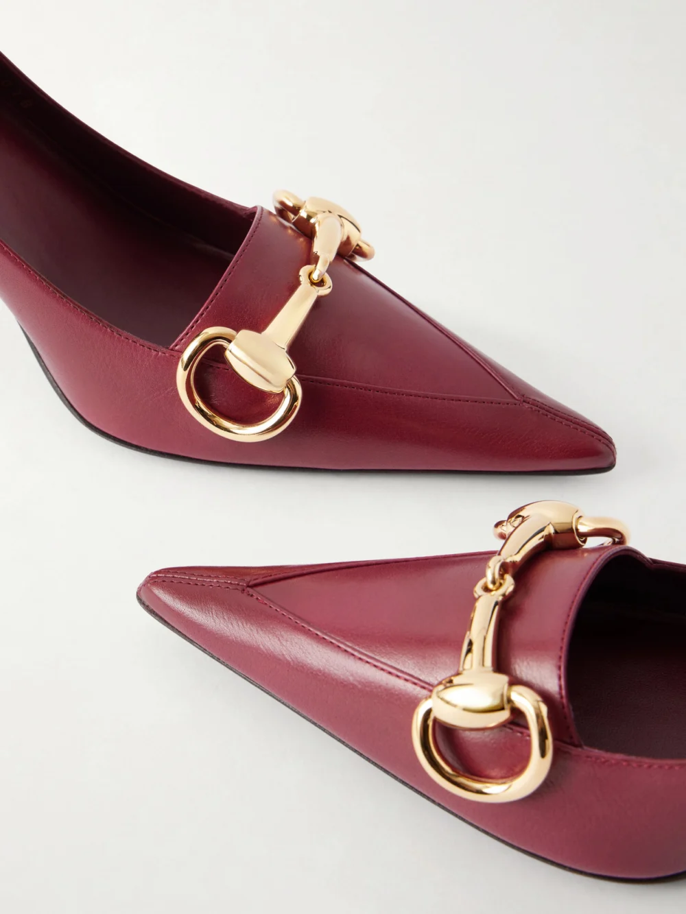 Close-up detail of the Gucci Boulevard Horsebit-embellished Leather Pumps