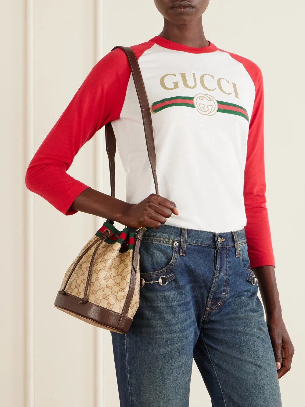 Gucci Bucket Small Leather-trimmed Coated Canvas-jacquard Shoulder Bag, styled view