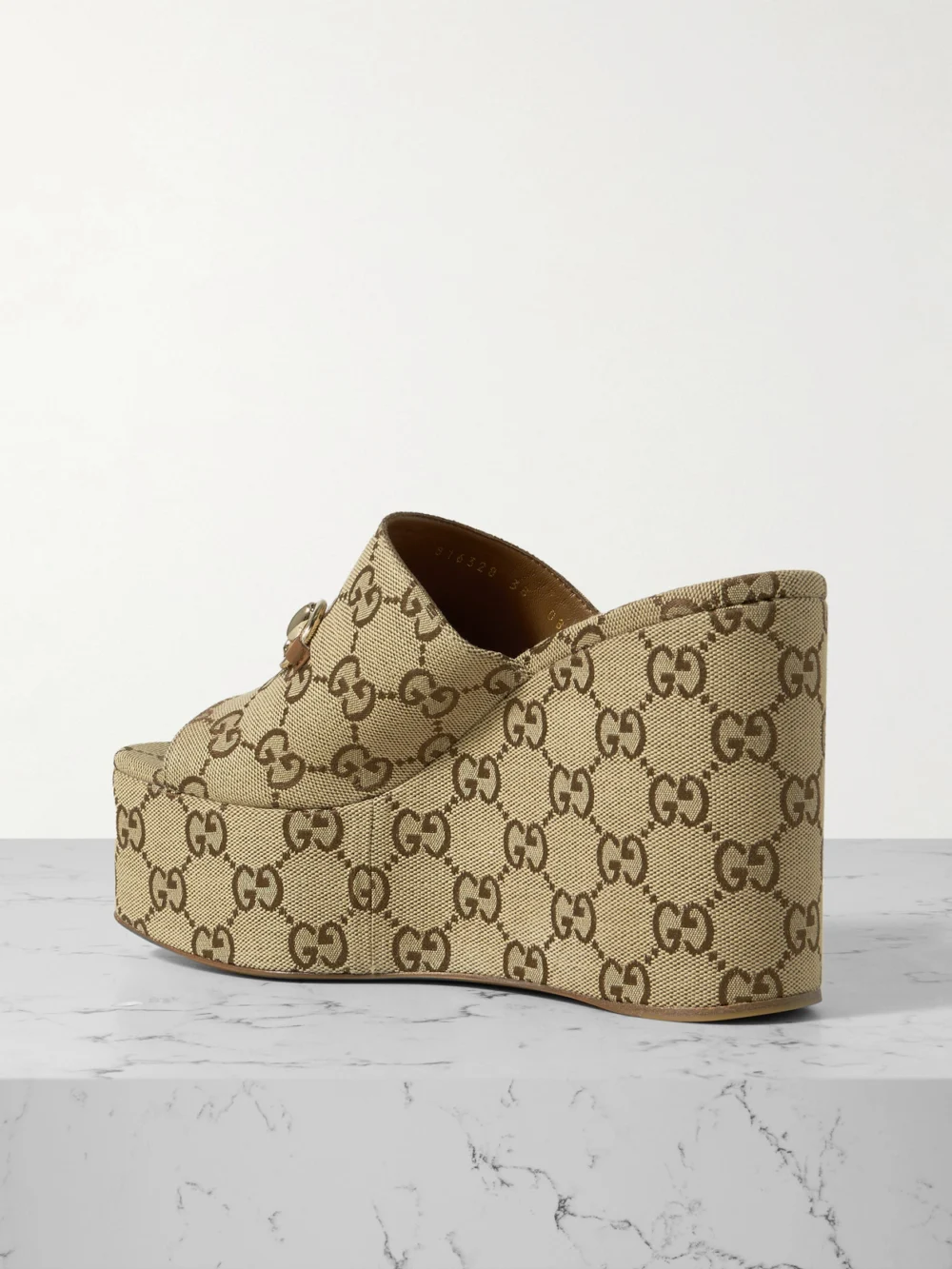 Back view of the Gucci Carmen Horsebit-embellished Canvas-jacquard Wedge Mules