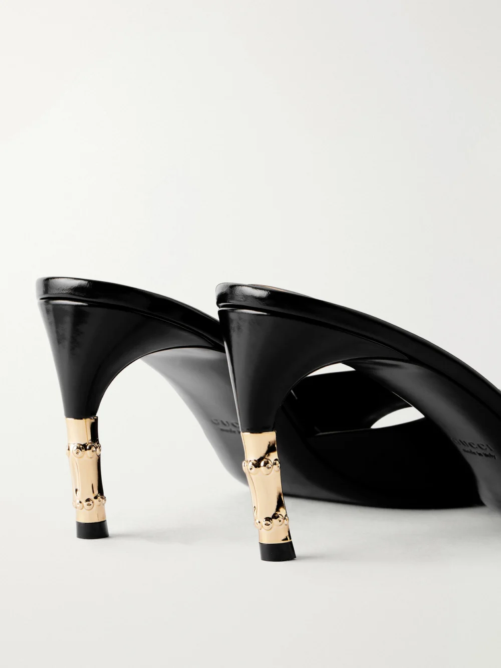 Close-up detail of the Gucci Castello Patent-leather Sandals