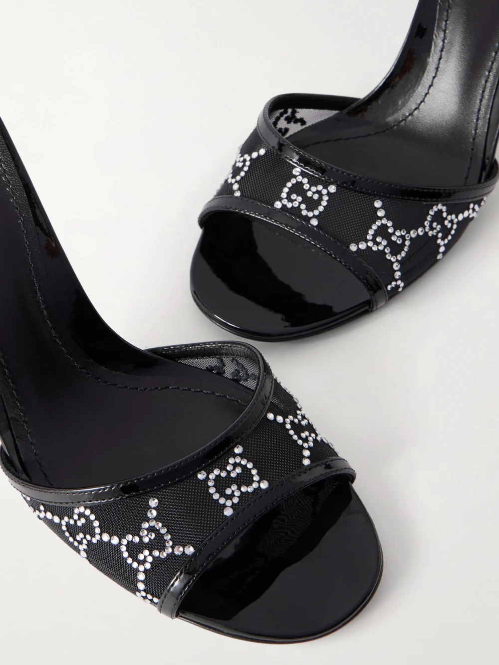 Close-up detail of the Gucci Crystal-embellished Leather-trimmed Mesh Sandals