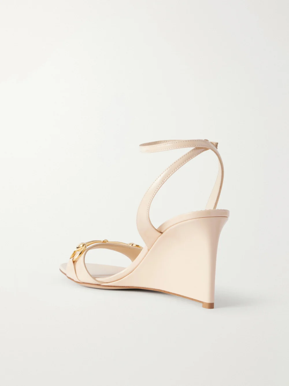Back view of the Gucci Donna 80 Horsebit-embellished Patent-leather Wedge Sandals