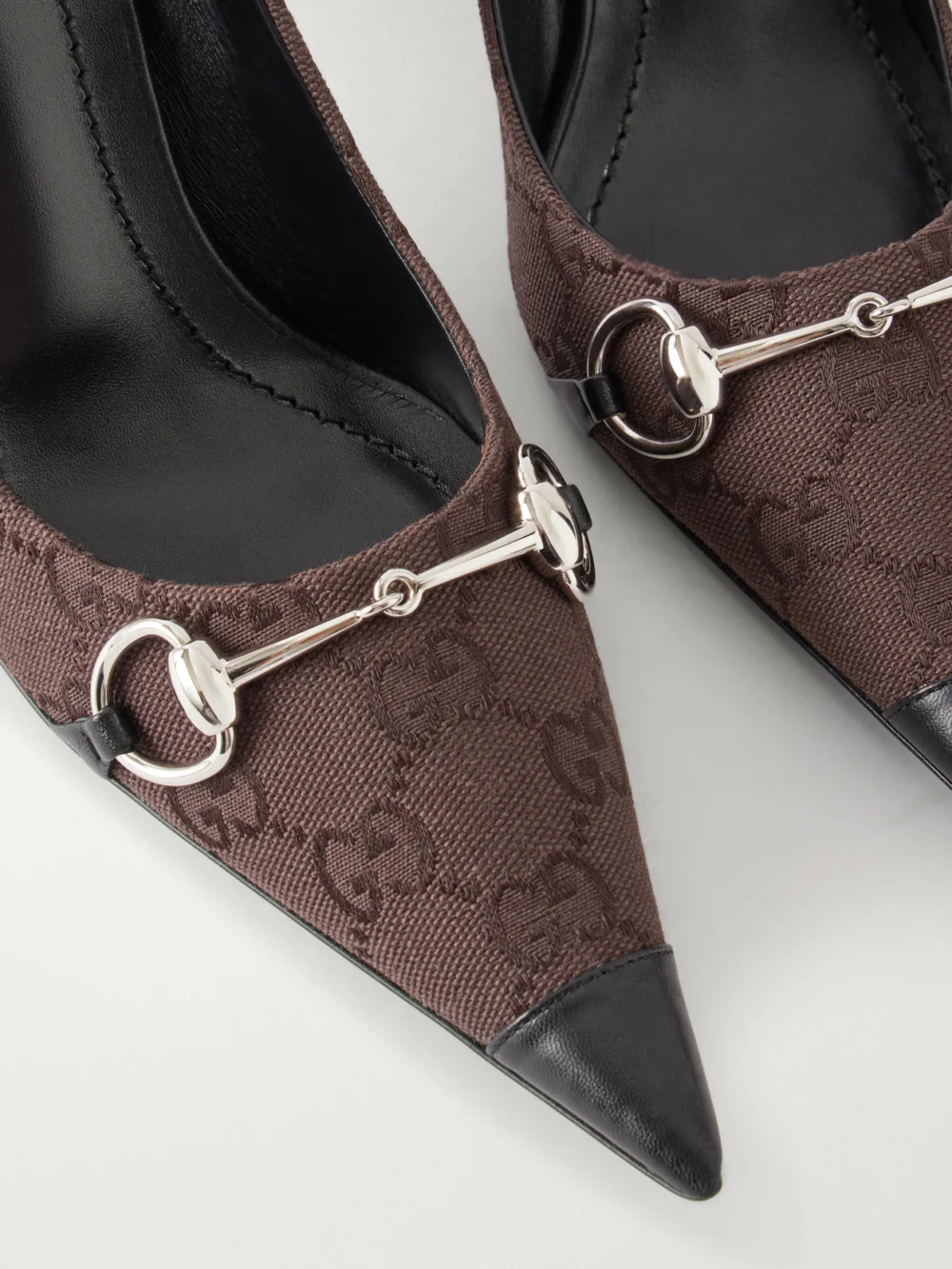 Close-up detail of the Gucci Donna Leather-trimmed Canvas-jacquard Pumps