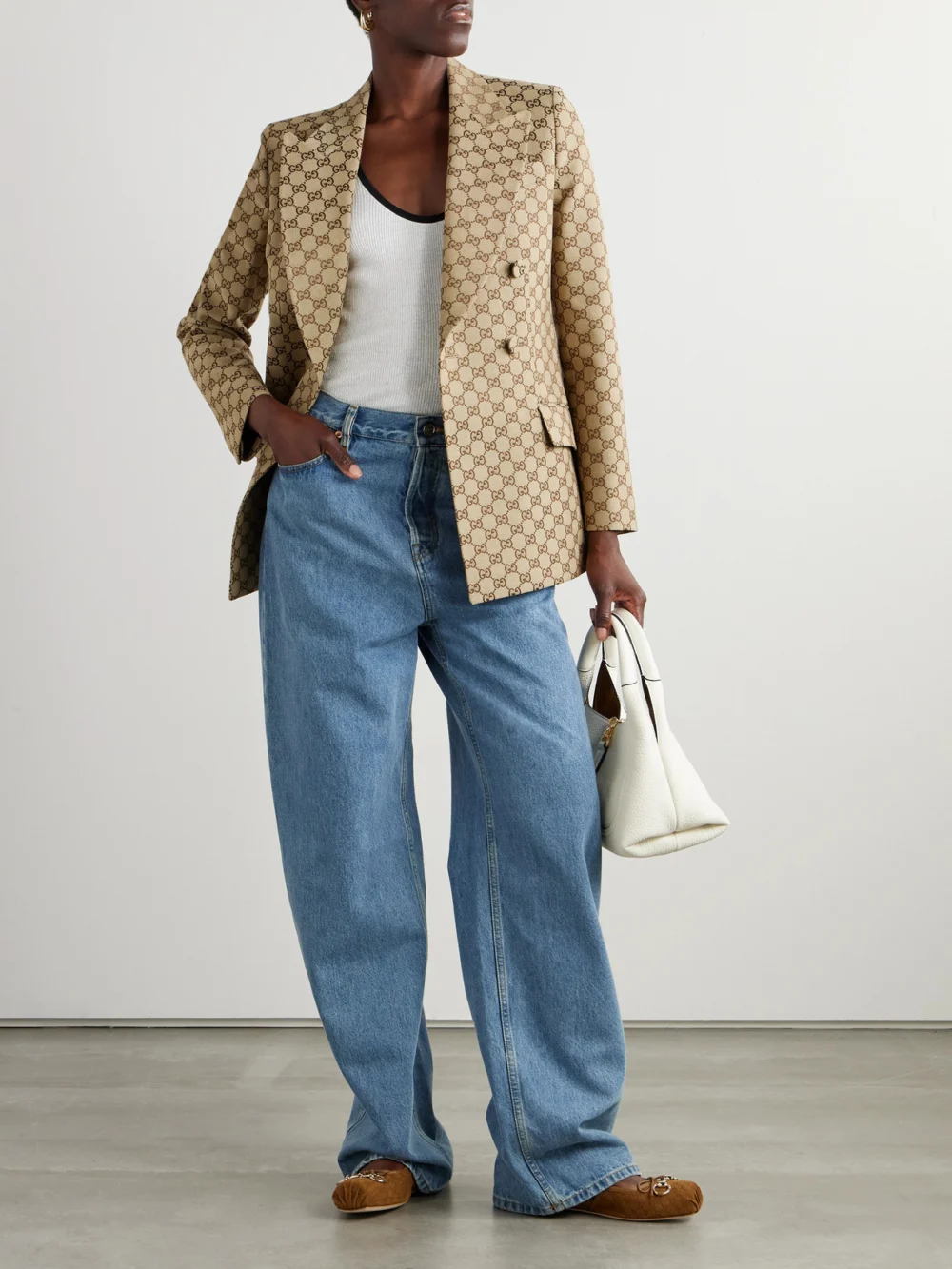 Gucci Double-breasted Cotton-blend Canvas-jacquard Blazer, worn by a model