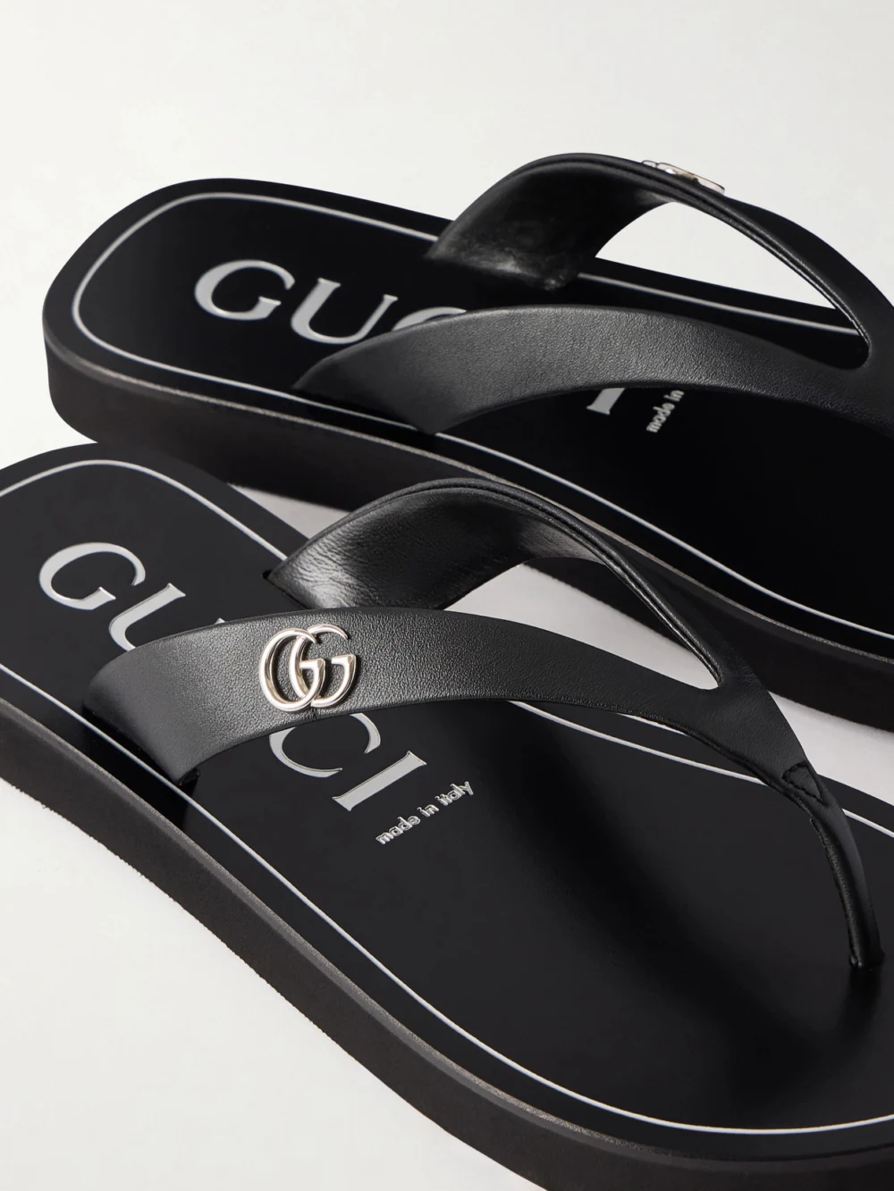 Close-up detail of the Gucci Embellished Leather Sandals