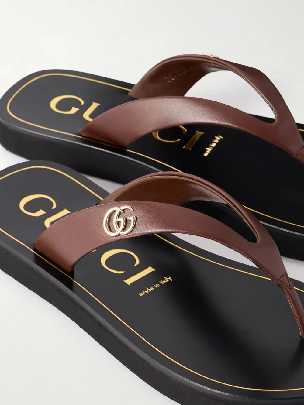 Close-up detail of the Gucci Embellished Leather Sandals