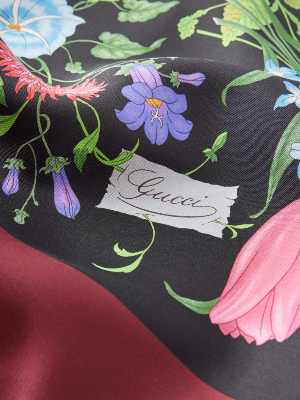 Close-up detail of the Gucci Flora Floral-print Silk Scarf