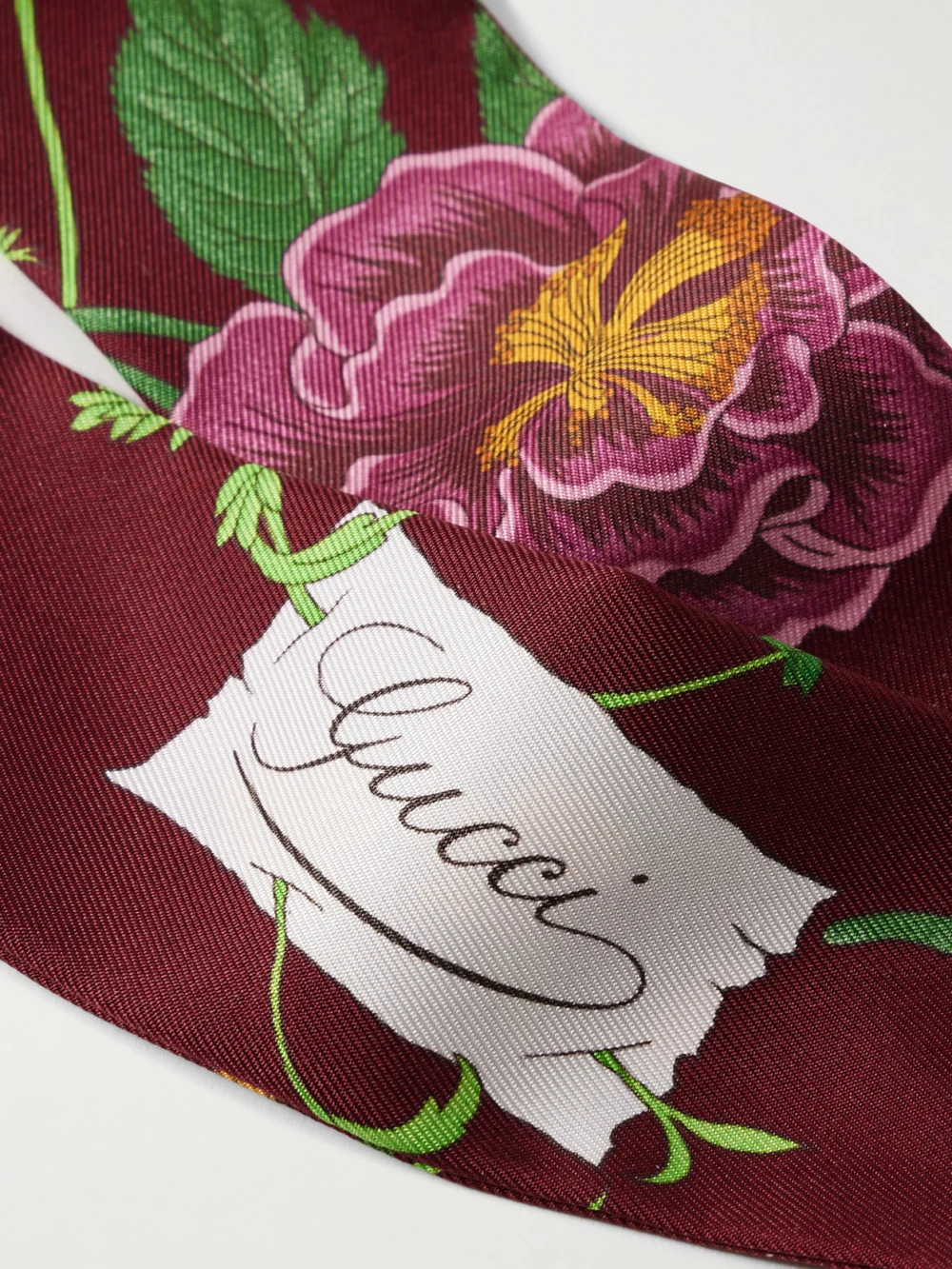 Close-up detail of the Gucci Flora Printed Silk-twill Scarf