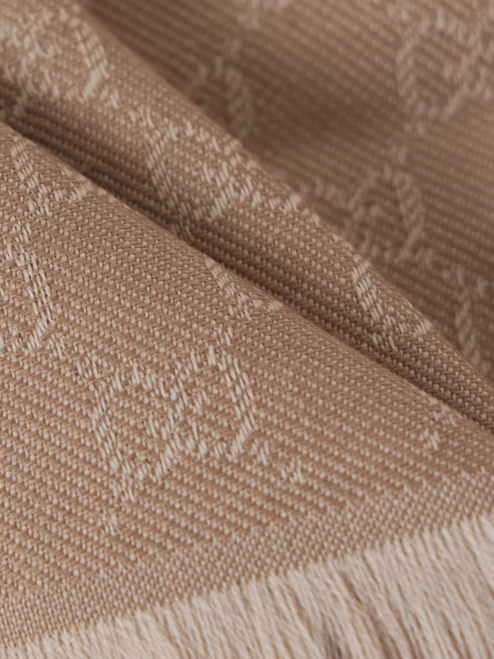 Close-up detail of the Gucci Frayed Wool-jacquard Scarf