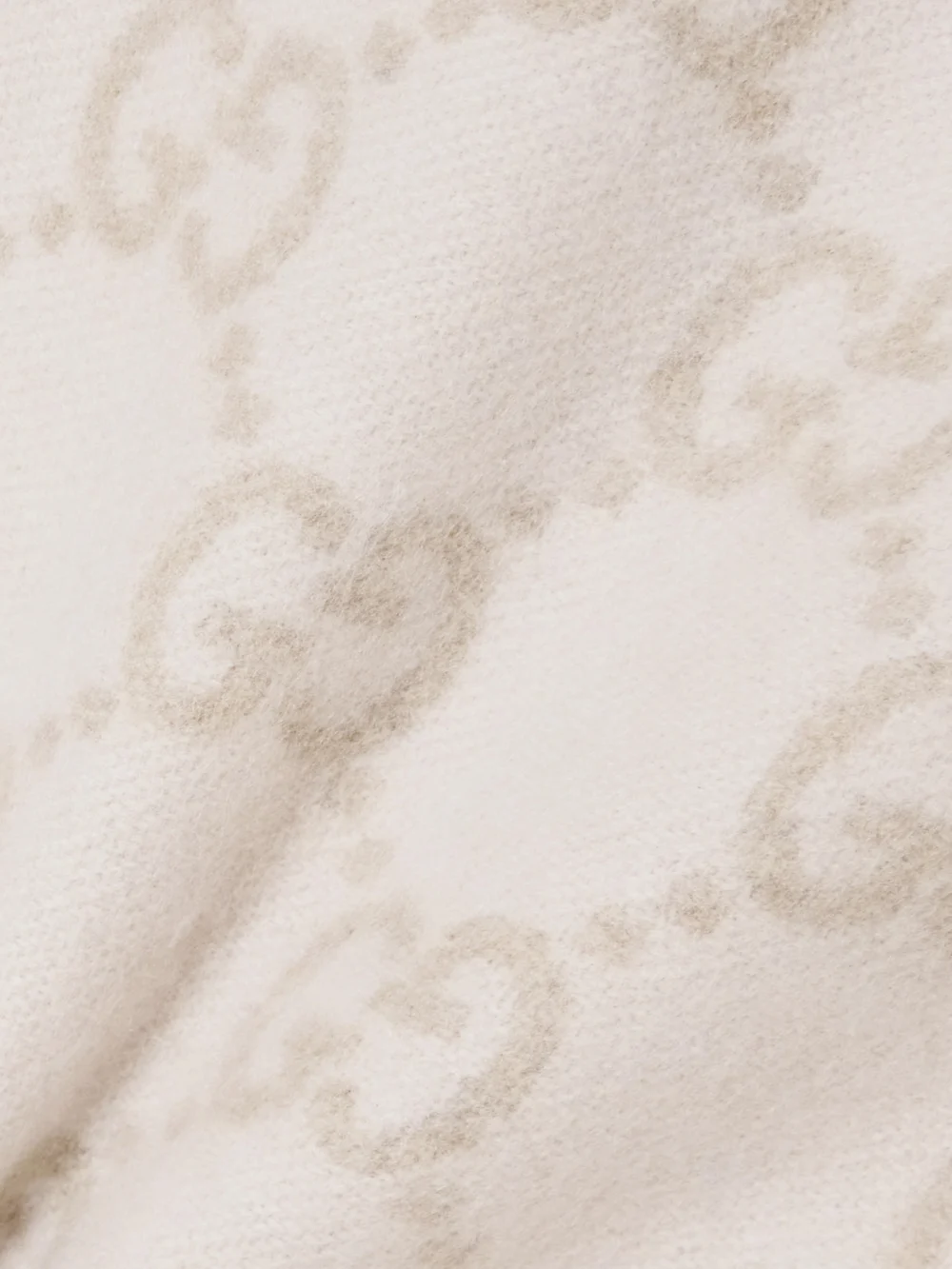 Close-up detail of the Gucci Fringed Jacquard-knit Cashmere Scarf