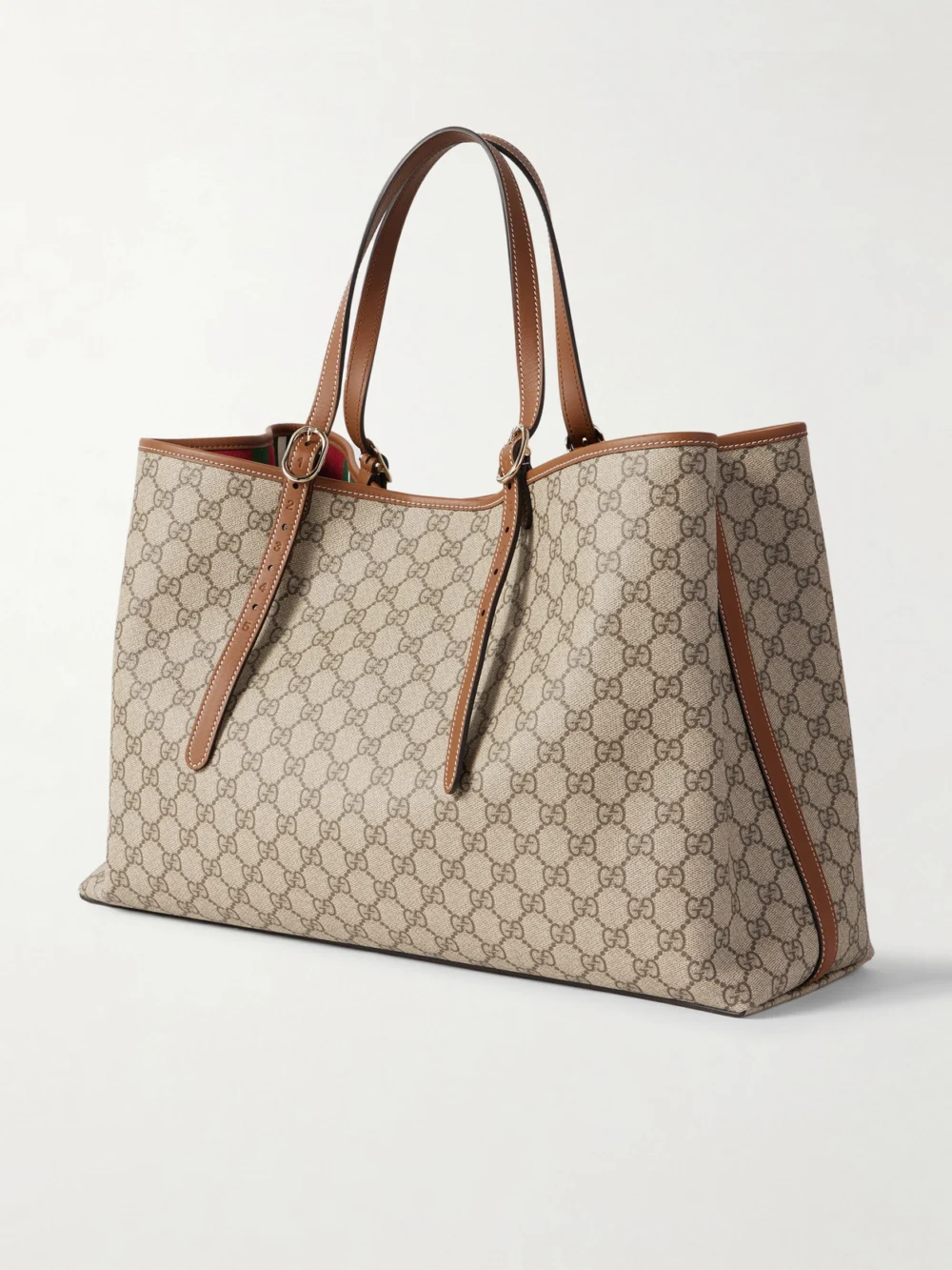 Back view of the Gucci Gg Emblem Leather-trimmed Coated Canvas-jacquard Tote