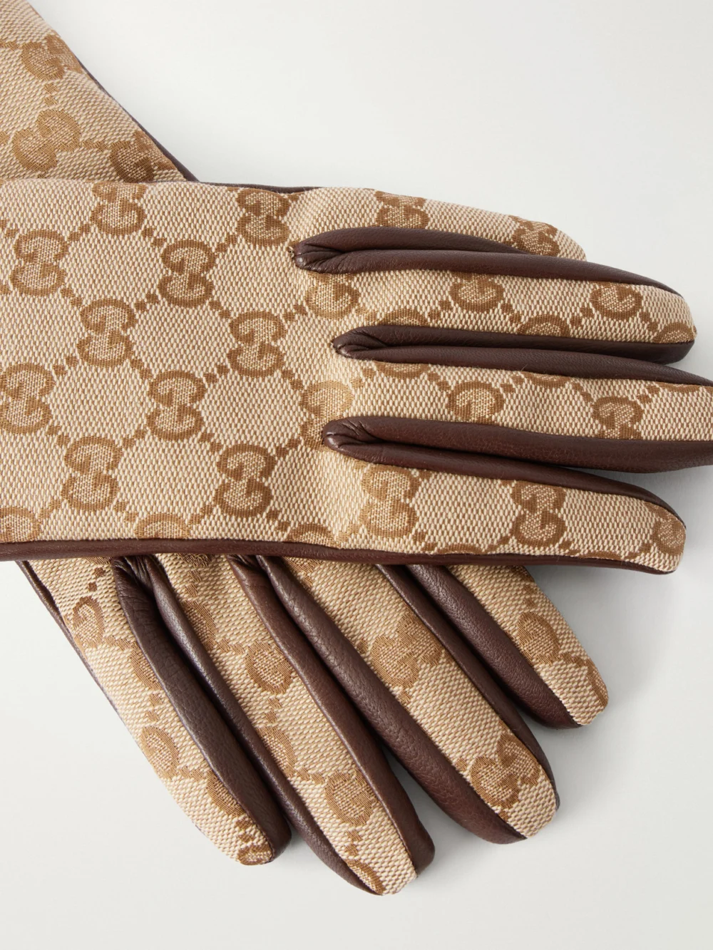 Close-up detail of the Gucci Gg-jacquard Canvas and Leather Gloves