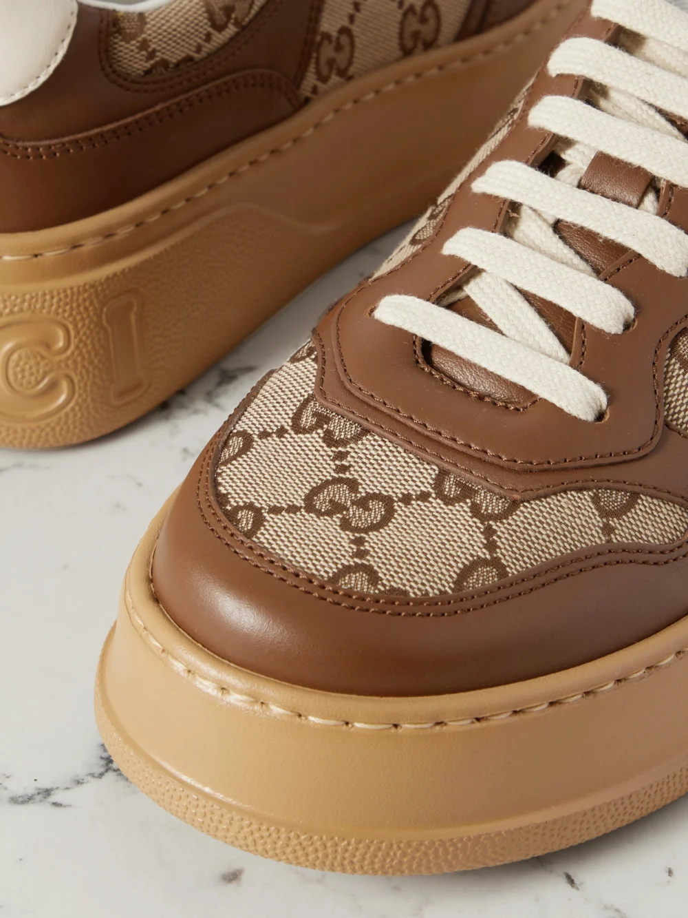Close-up detail of the Gucci Gg Leather and Canvas Sneakers