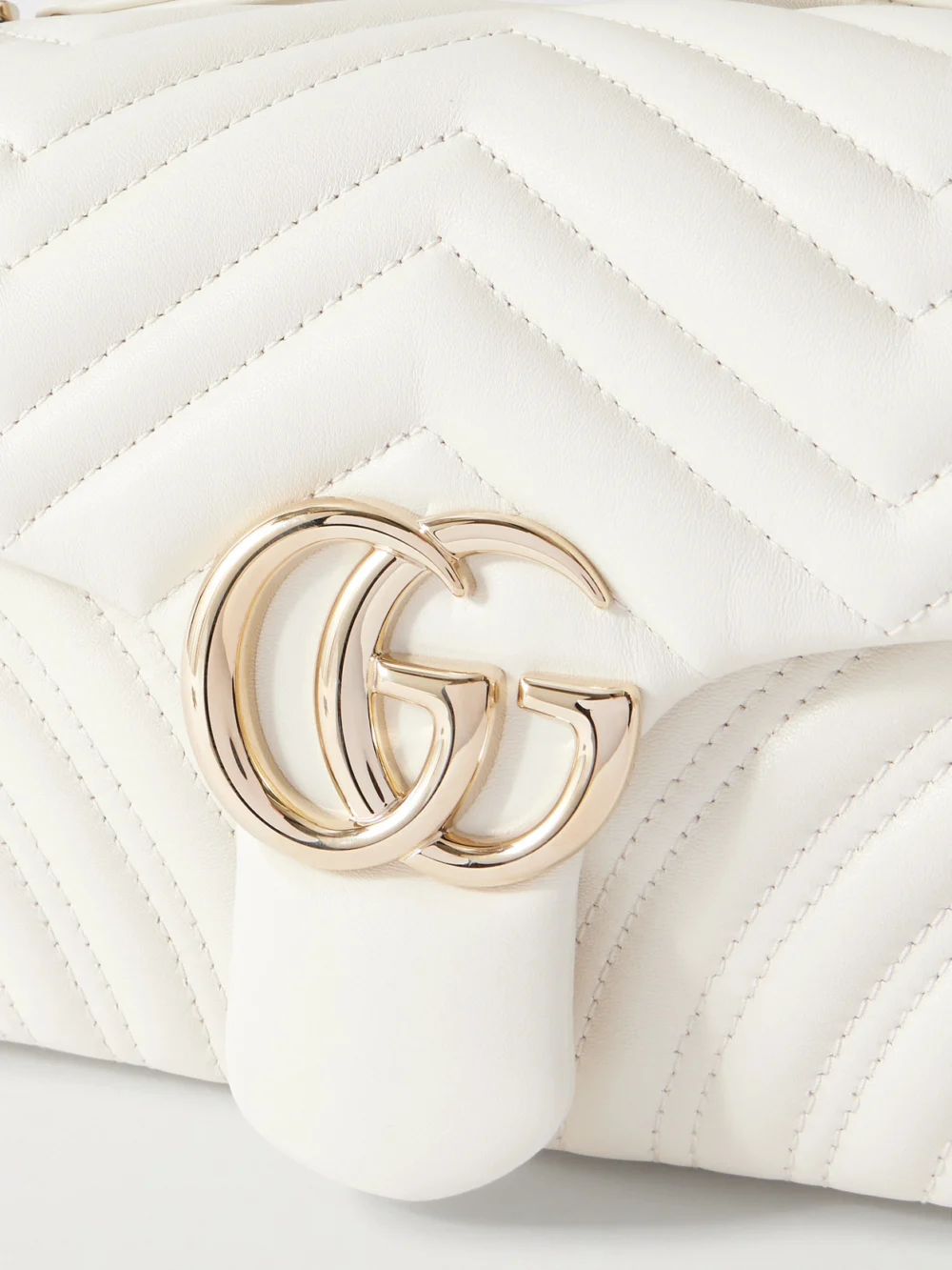 Close-up detail of the Gucci Gg Marmont Quilted Leather Shoulder Bag