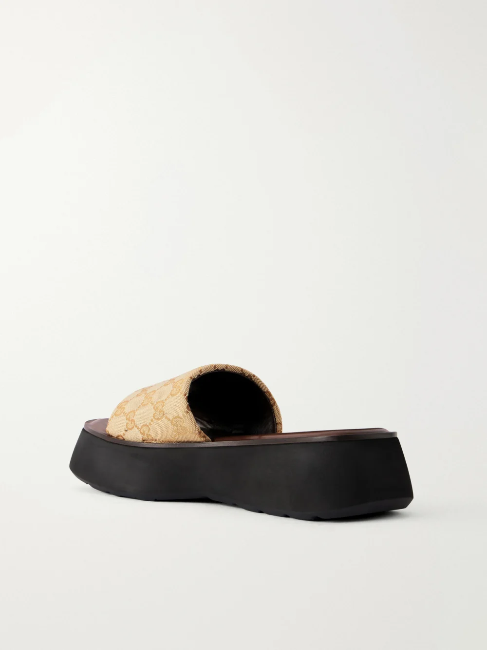Back view of the Gucci Gg Supreme-jacquard Canvas Platform Slides