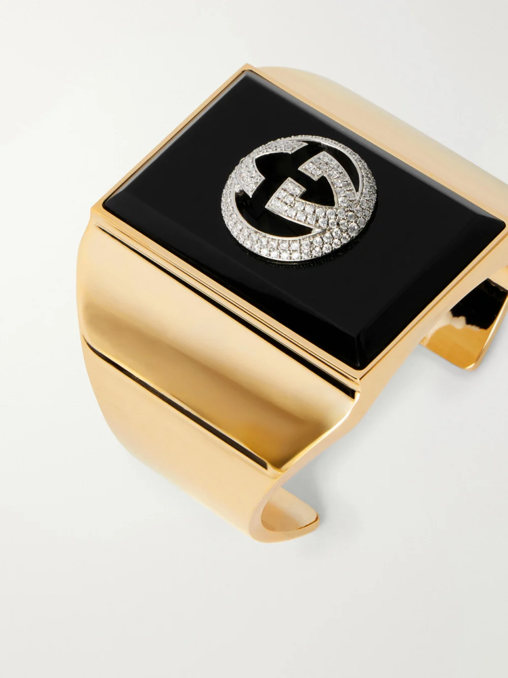 Close-up detail of the Gucci Gold-tone Zircon and Enamel Bangle