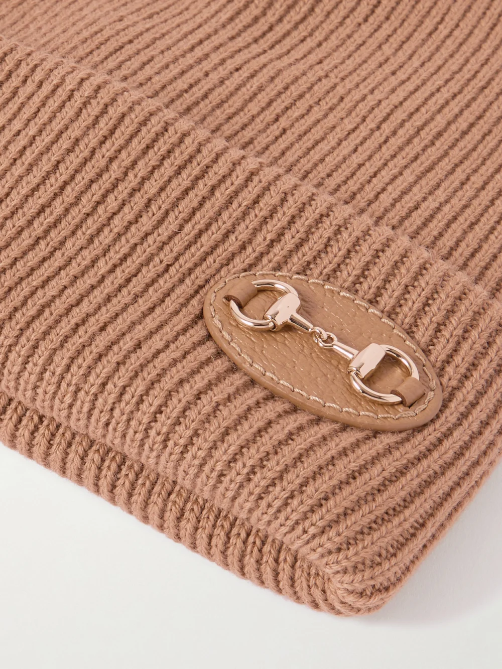 Close-up detail of the Gucci Horsebit-detailed Appliquéd Ribbed Wool Beanie
