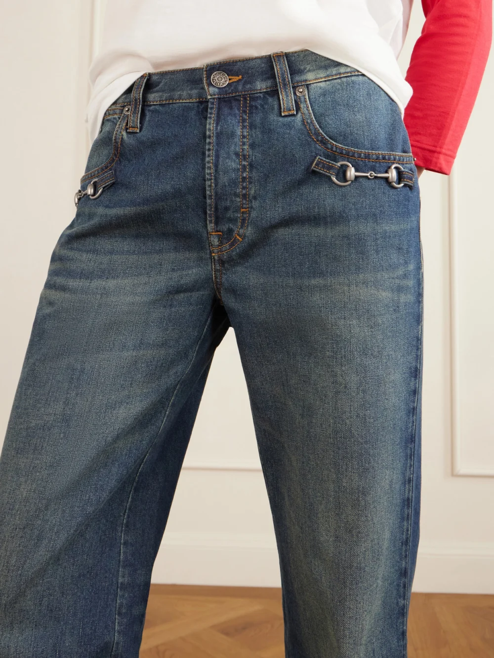 Close-up detail of the Gucci Horsebit-embellished Mid-rise Wide-leg Jeans