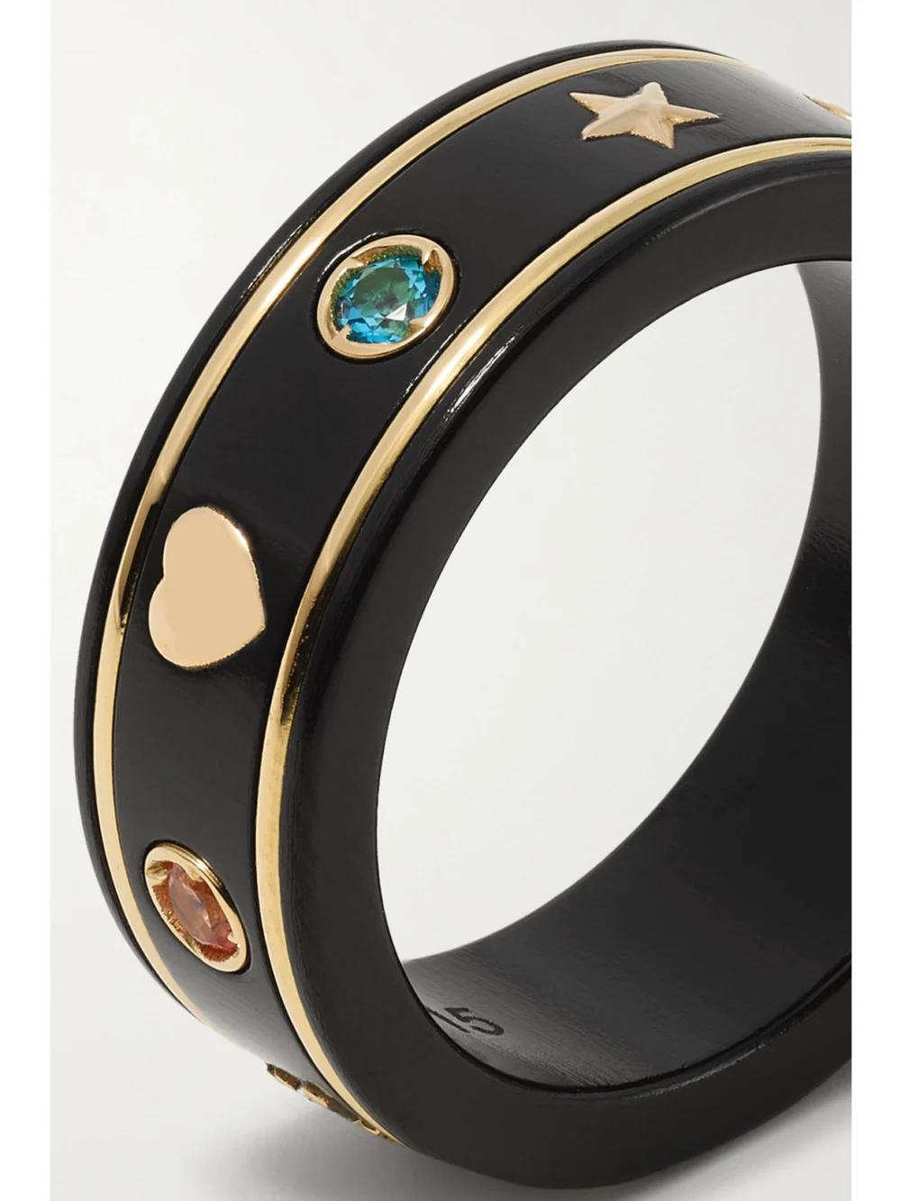 Close-up detail of the Gucci Icon 18-karat Gold Topaz Ring