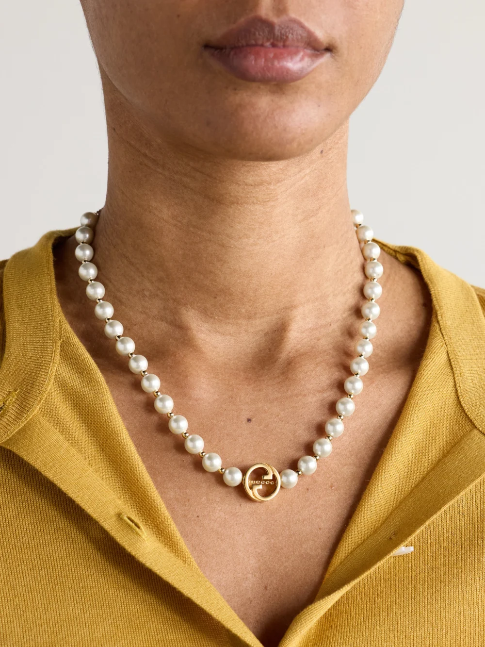 Gucci Interlocking G Gold-tone Pearl-like Necklace, styled view