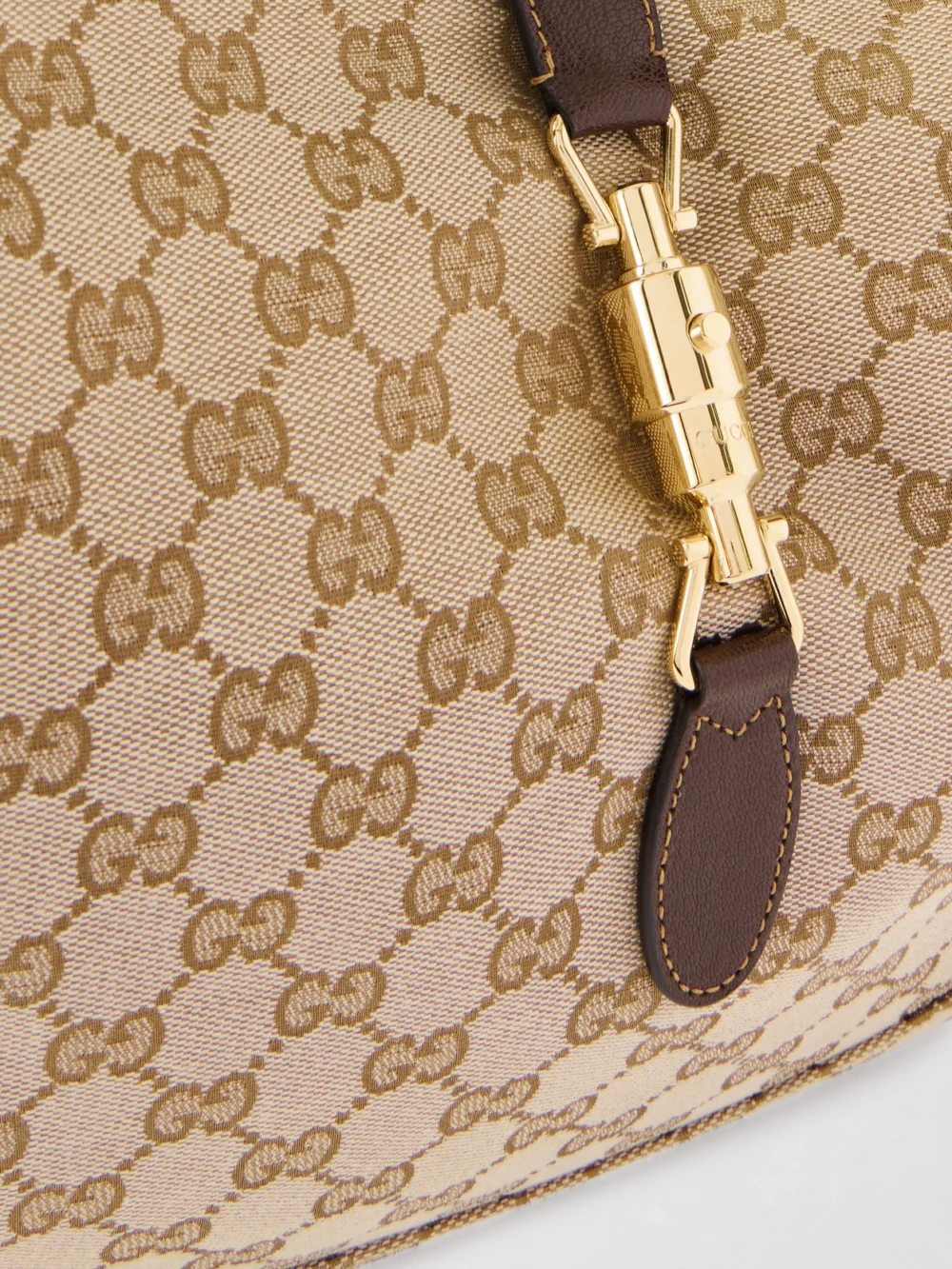 Close-up detail of the Gucci Jackie 1961 Leather-trimmed Coated Canvas-jacquard Shoulder Bag