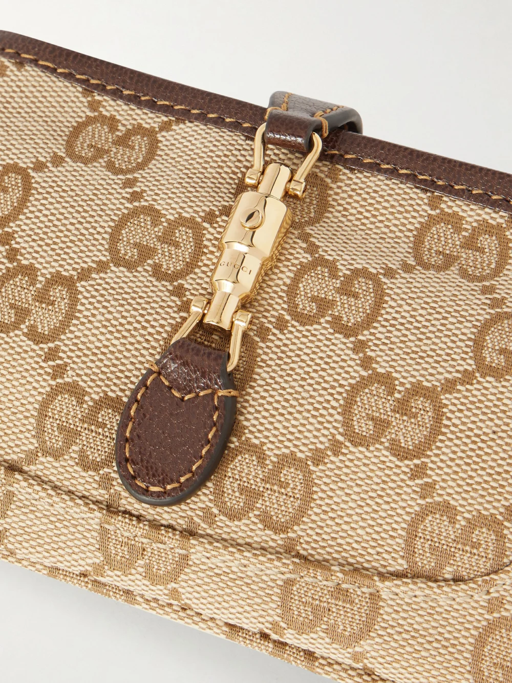 Close-up detail of the Gucci Jackie Leather-trimmed Canvas-jacquard Wallet
