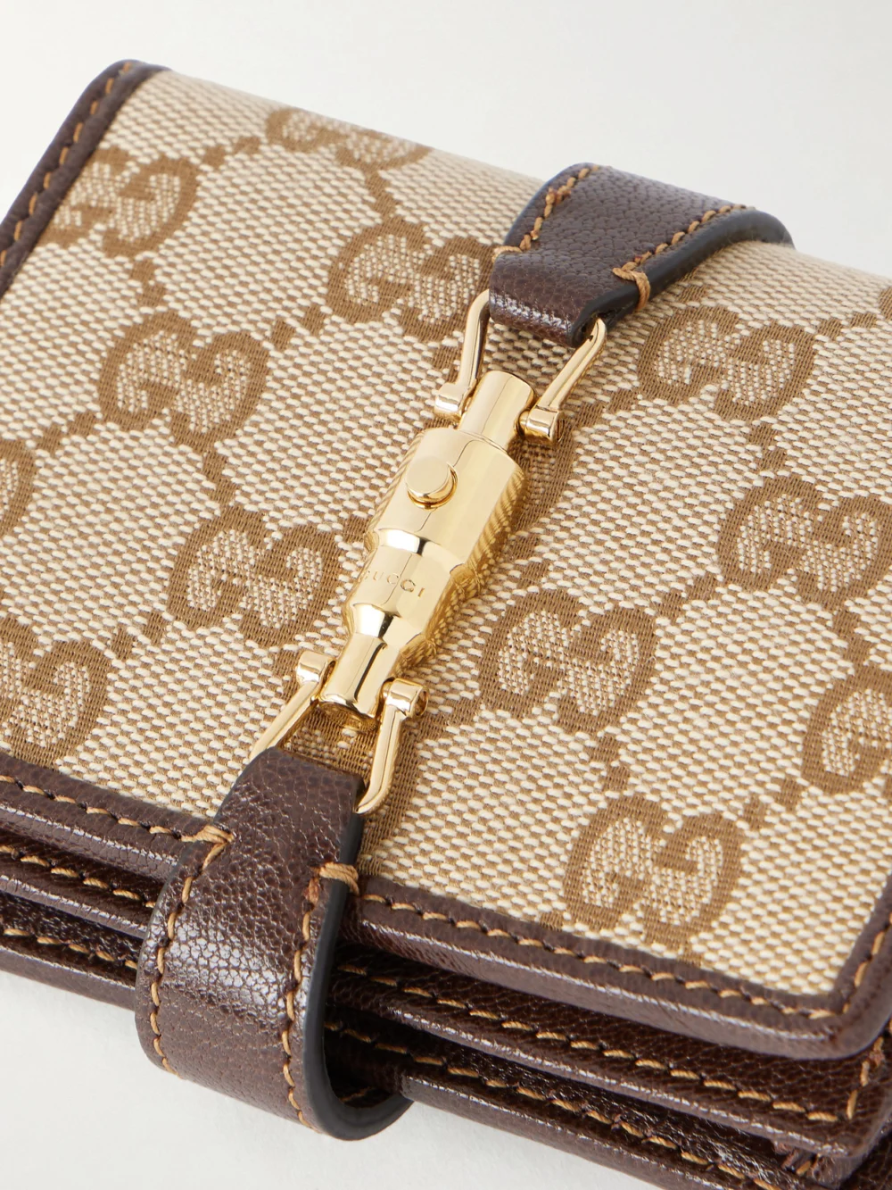 Gucci Jackie Leather-trimmed Canvas-jacquard Wallet, styled view