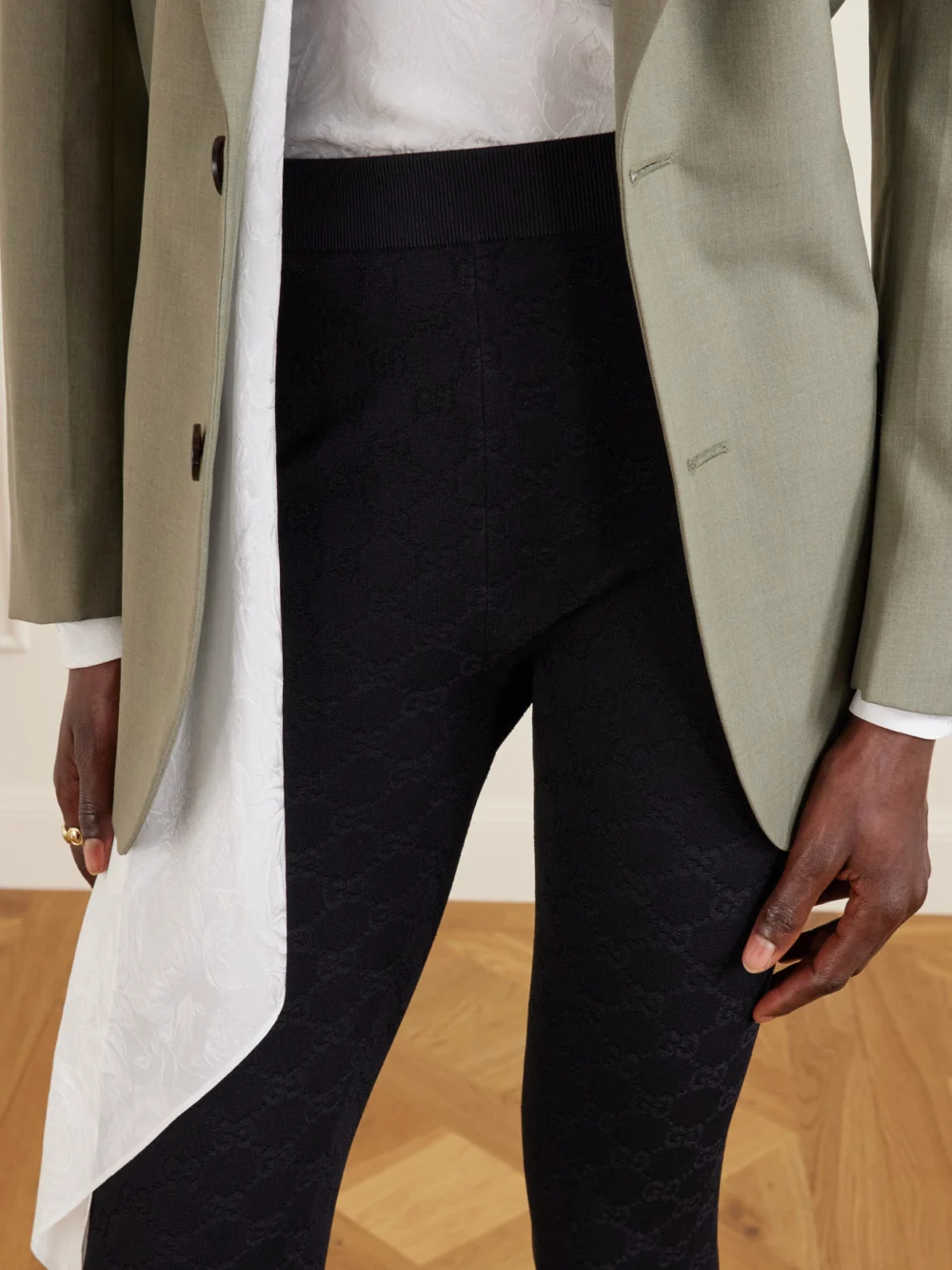 Close-up detail of the Gucci Jacquard-knit Leggings