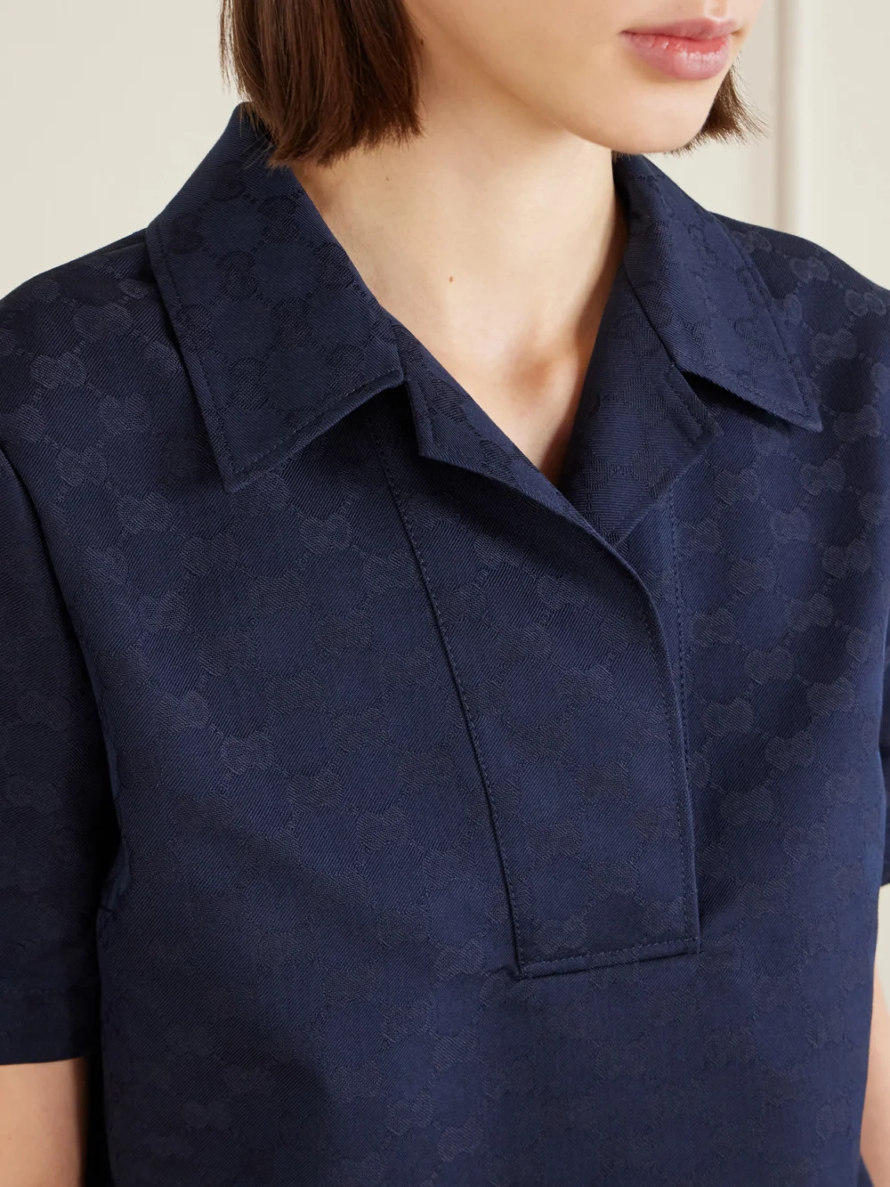Close-up detail of the Gucci Jacquard Polo Top
