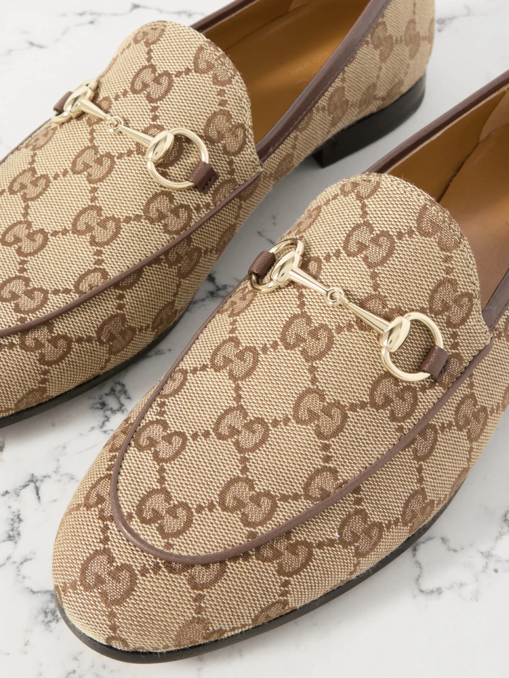 Close-up detail of the Gucci Jordaan Horsebit-detailed Leather-trimmed Canvas-jacquard Loafers