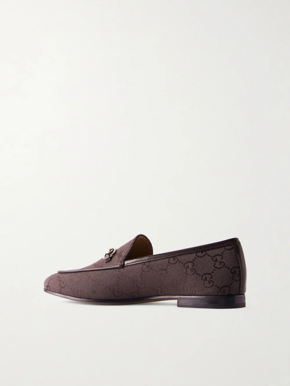 Back view of the Gucci Jordaan Horsebit-detailed Leather-trimmed Canvas-jacquard Loafers