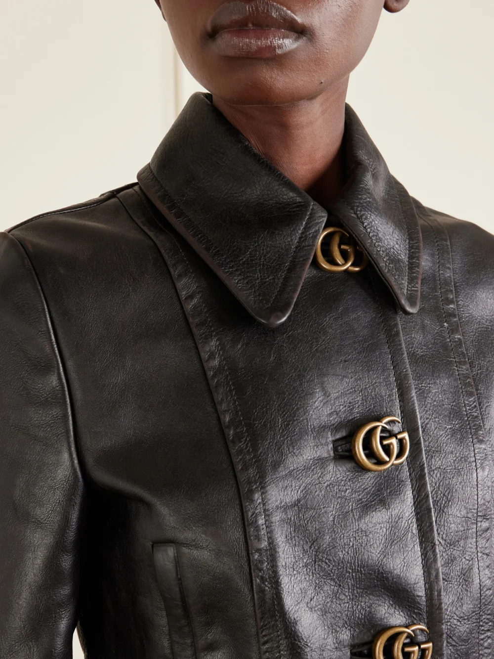 Close-up detail of the Gucci Leather Jacket