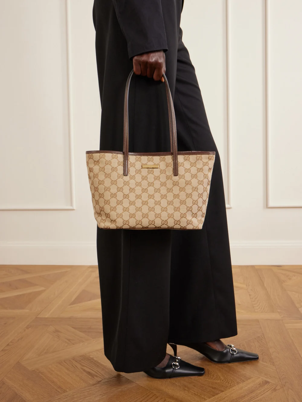 Gucci Leather-trimmed Coated Canvas-jacquard Tote, styled view