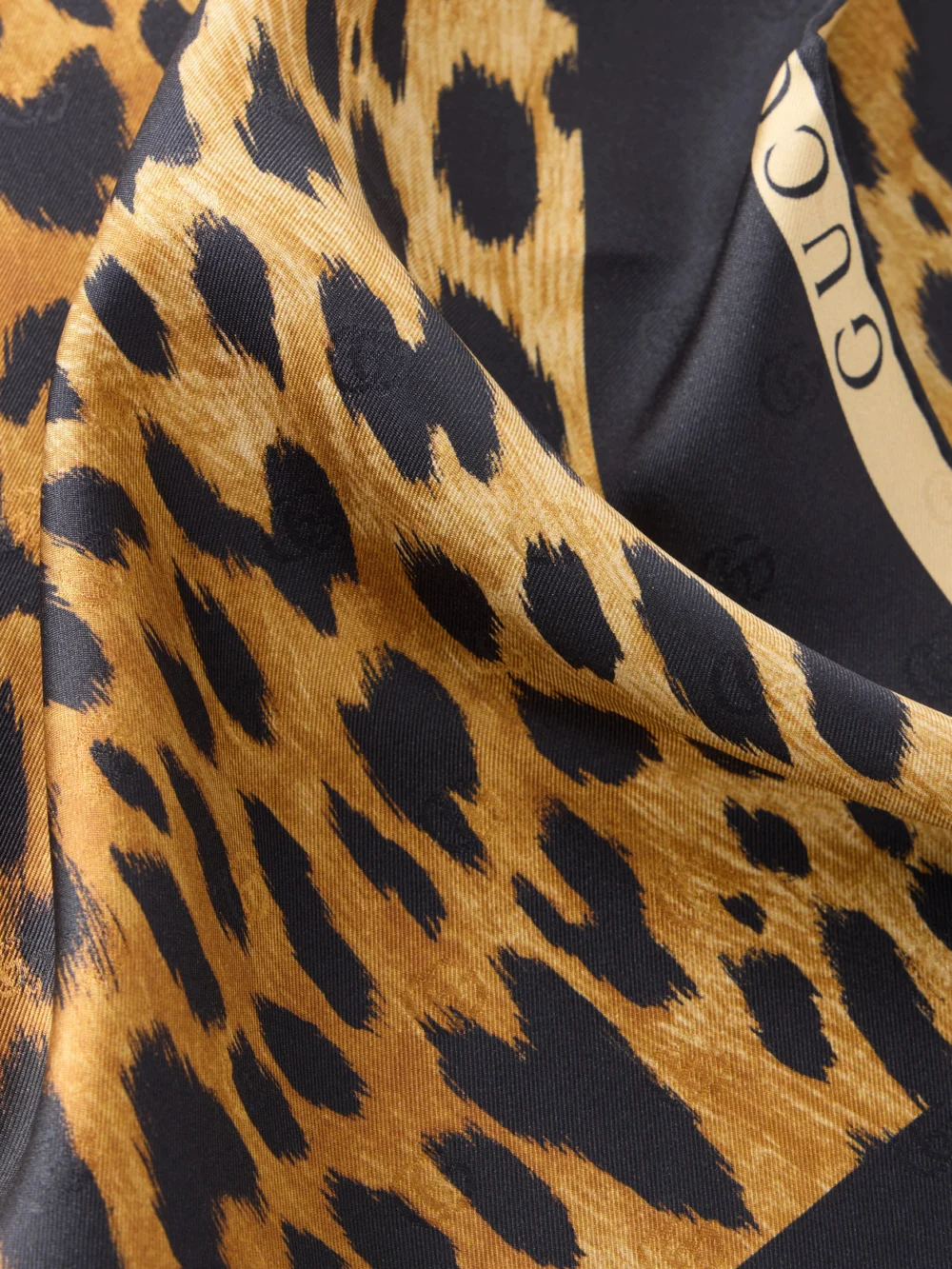Close-up detail of the Gucci Leopard-print Silk-twill Scarf
