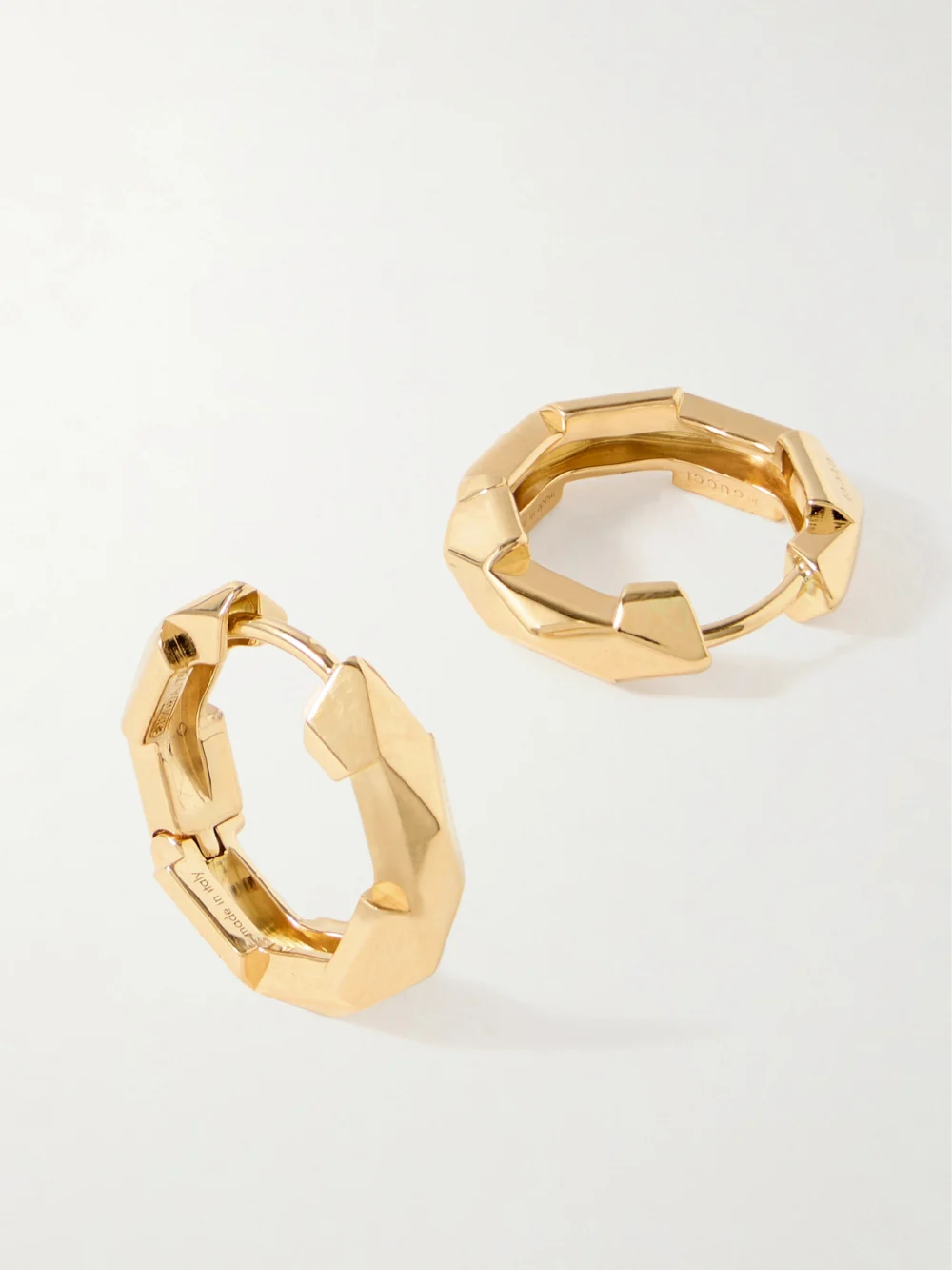 Close-up detail of the Gucci Link to Love 18-karat Gold Hoop Earrings