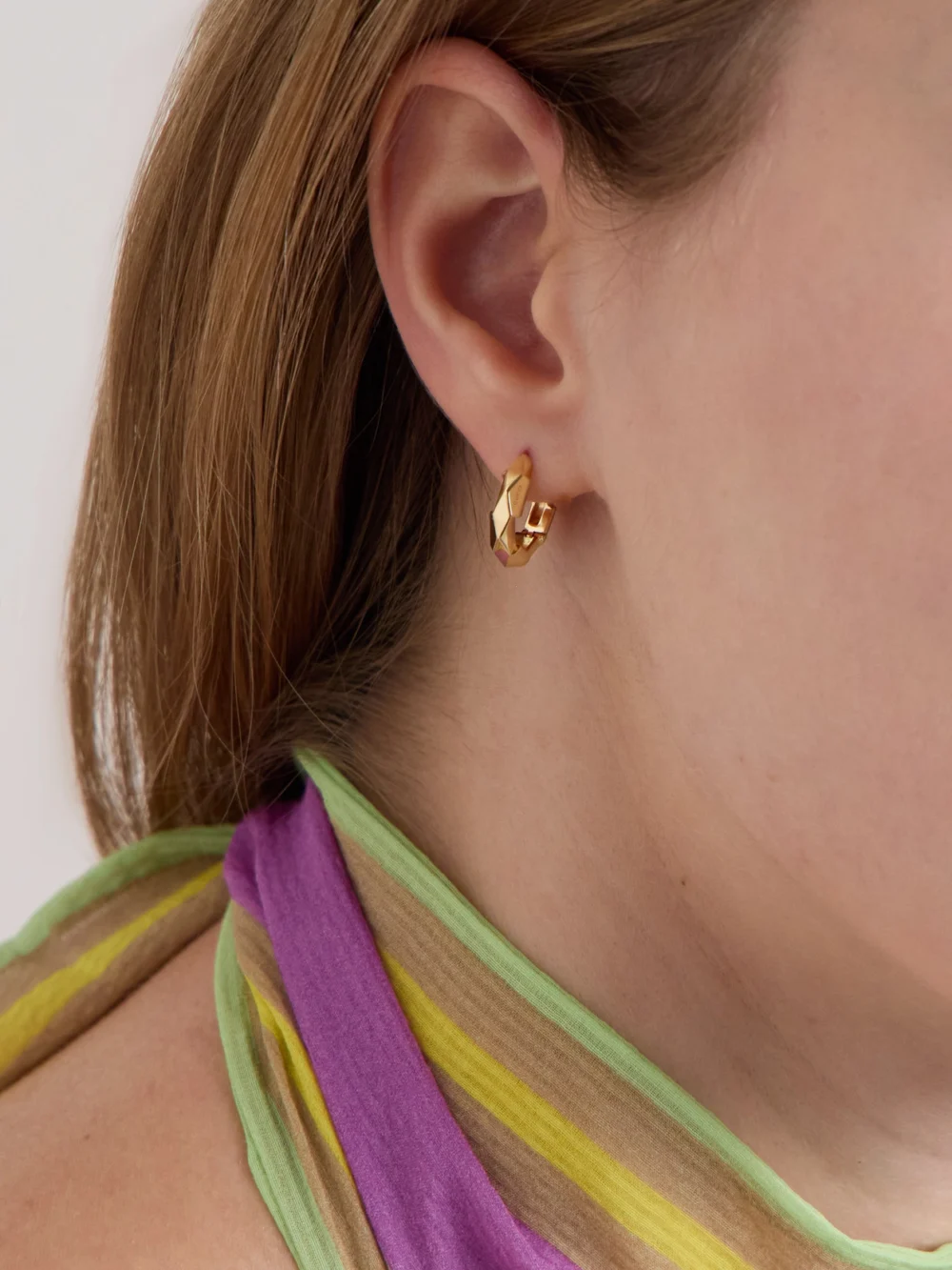 Gucci Link to Love 18-karat Gold Hoop Earrings, styled view