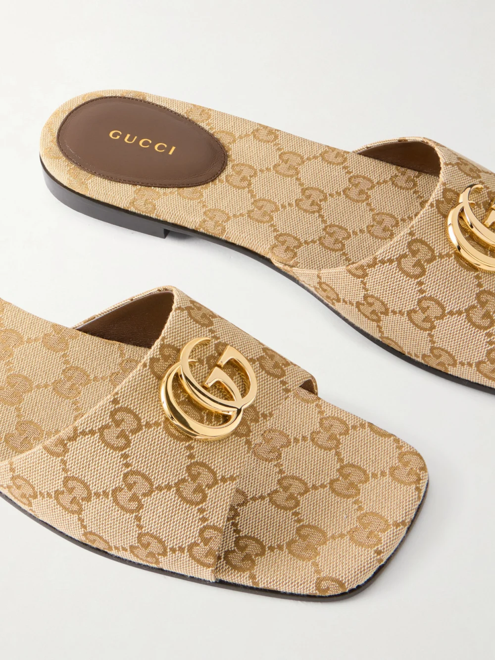 Close-up detail of the Gucci Logo-jacquard Sandals