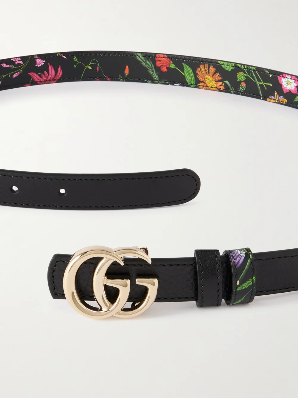 Close-up detail of the Gucci Marmont Reversible Floral-print Leather Belt