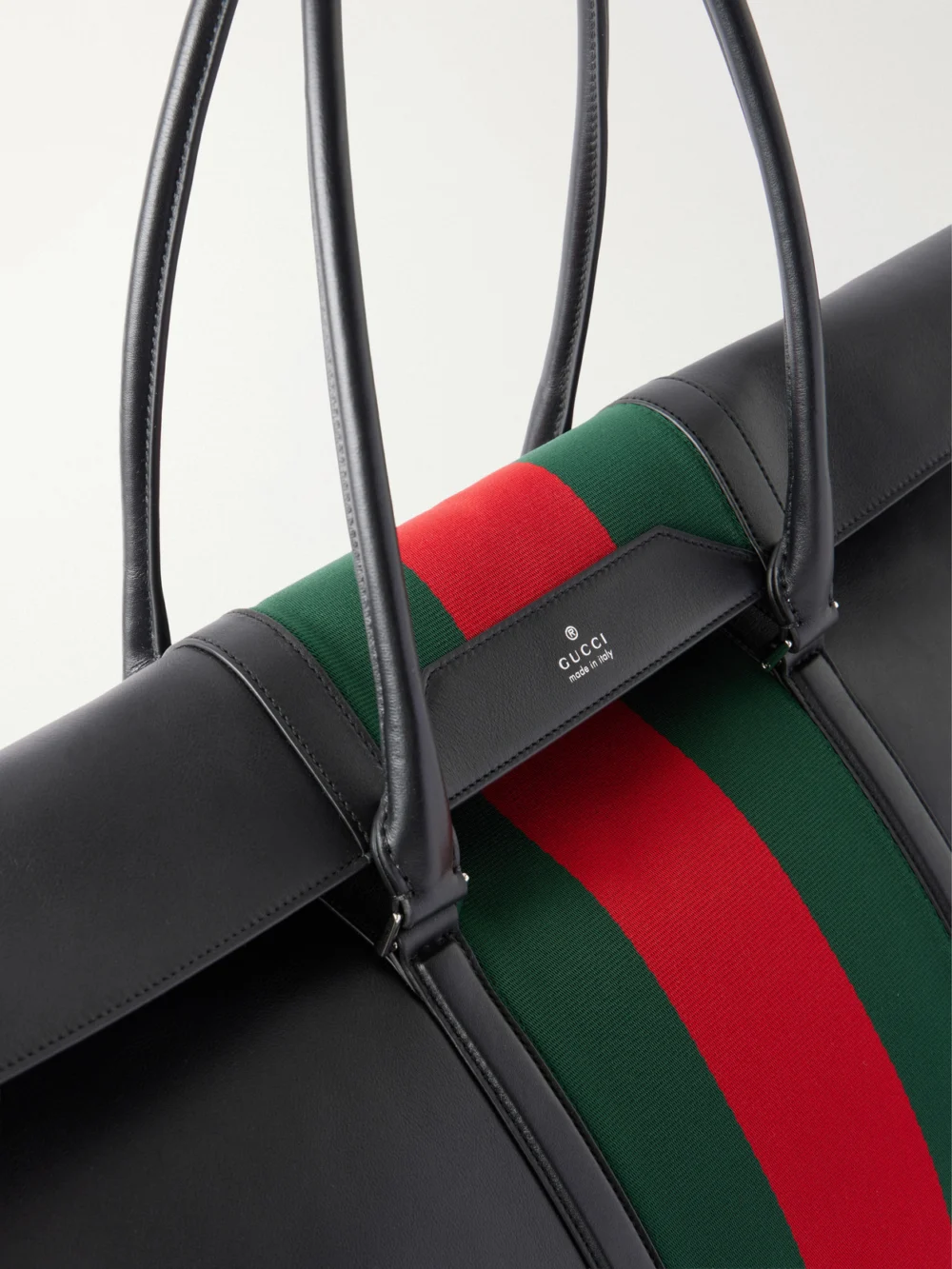 Close-up detail of the Gucci Mega Web Trademark Medium Canvas-trimmed Leather Tote