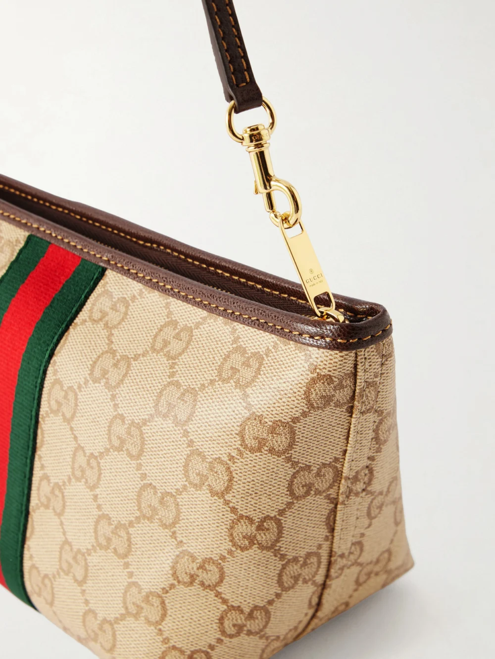 Close-up detail of the Gucci Mini Leather-trimmed Coated Canvas-jacquard Shoulder Bag