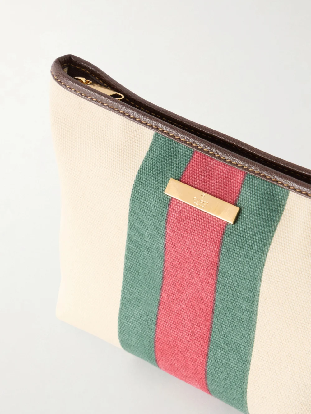Close-up detail of the Gucci Mini Leather-trimmed Coated-canvas Shoulder Bag