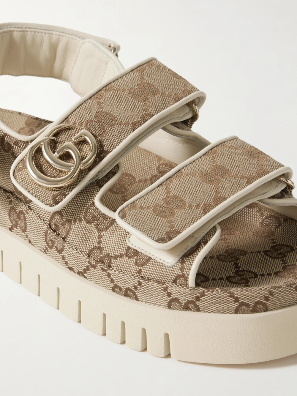 Close-up detail of the Gucci New Marmont Leather-trimmed Embellished Canvas-jacquard Platform Sandals