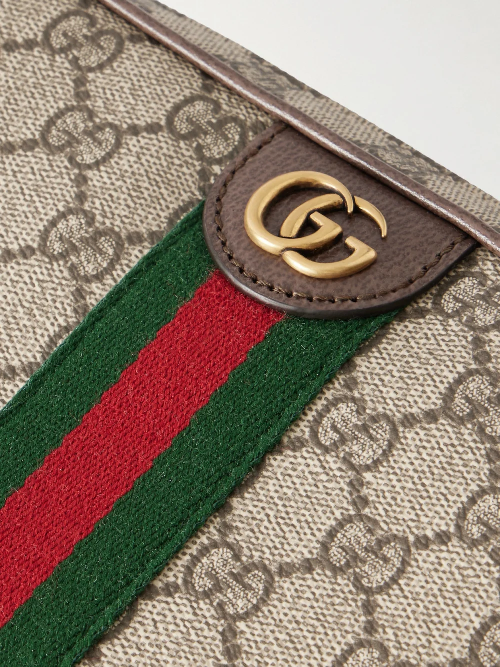 Close-up detail of the Gucci Ophidia Leather-trimmed Coated Canvas-jacquard Shoulder Bag