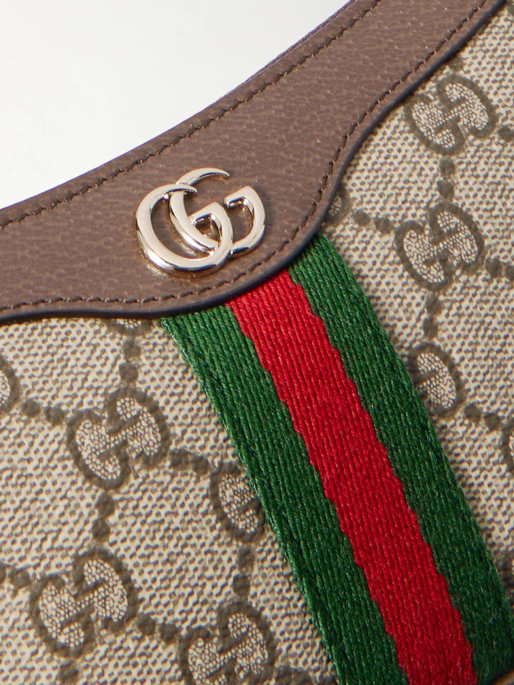 Close-up detail of the Gucci Ophidia Mini Leather-trimmed Coated Canvas-jacquard Shoulder Bag