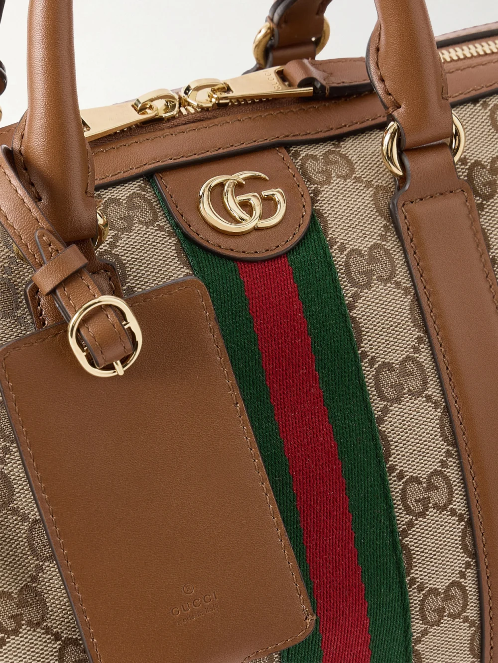 Close-up detail of the Gucci Ophidia Webbing and Leather-trimmed Canvas-jacquard Shoulder Bag
