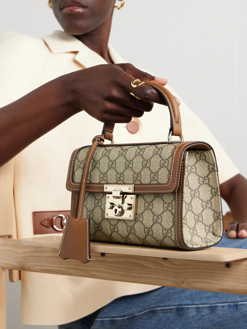 Gucci Padlock Small Leather-trimmed Coated Canvas-jacquard Top-handle Bag, styled view