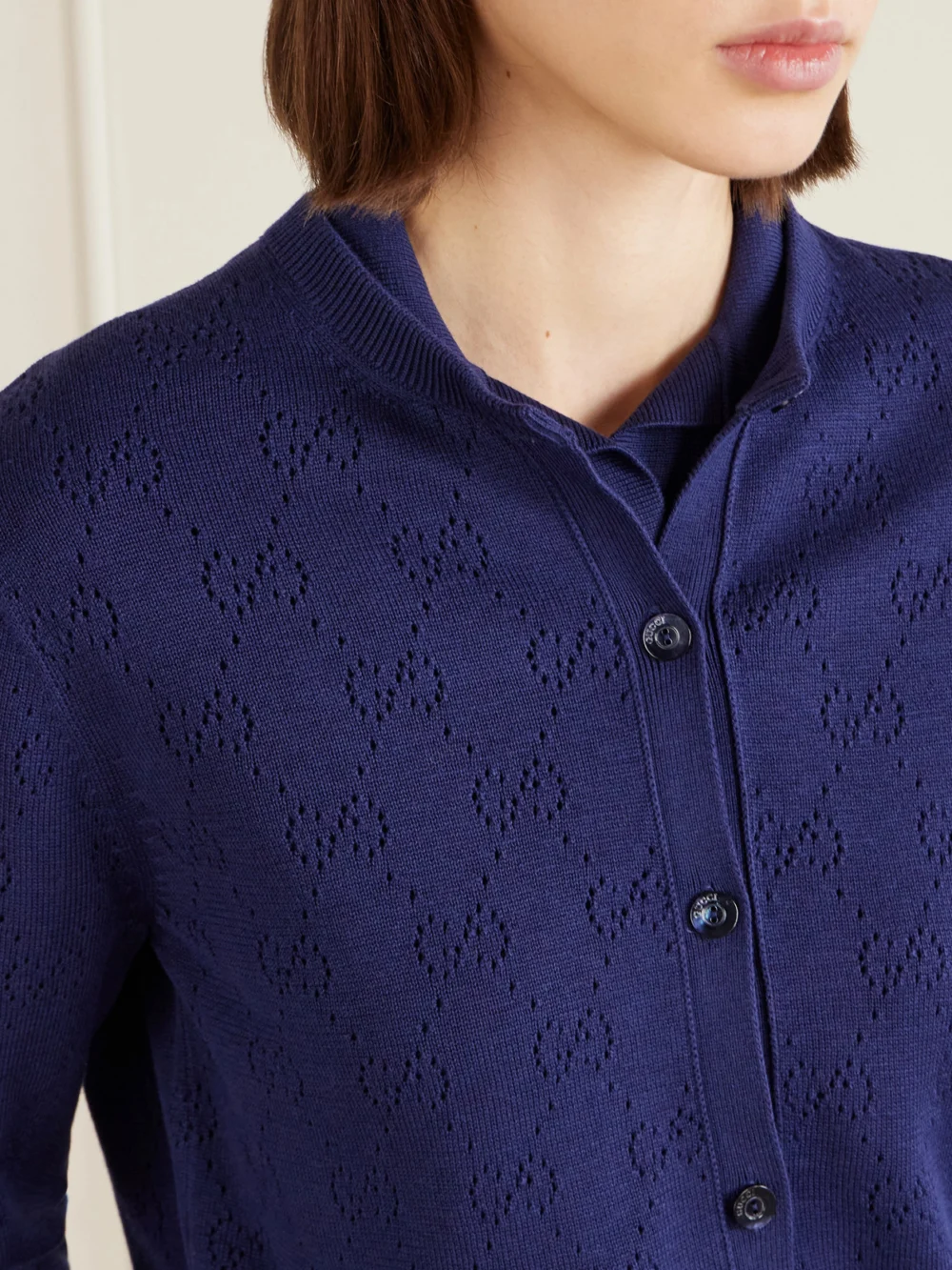 Close-up detail of the Gucci Perforated Silk-blend Cardigan