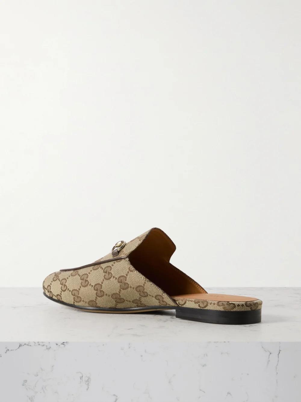 Back view of the Gucci Princetown Horsebit-detailed Leather-trimmed Canvas-jacquard Slippers