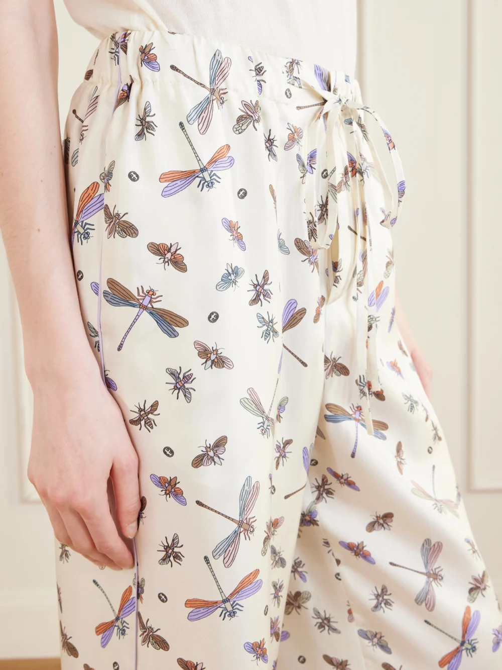 Close-up detail of the Gucci Printed Silk-satin Wide-leg Pants