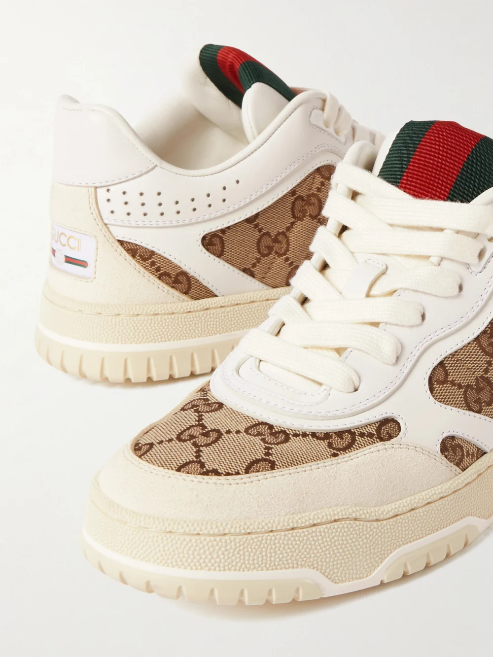 Close-up detail of the Gucci Re-web Leather and Canvas-jacquard Sneakers